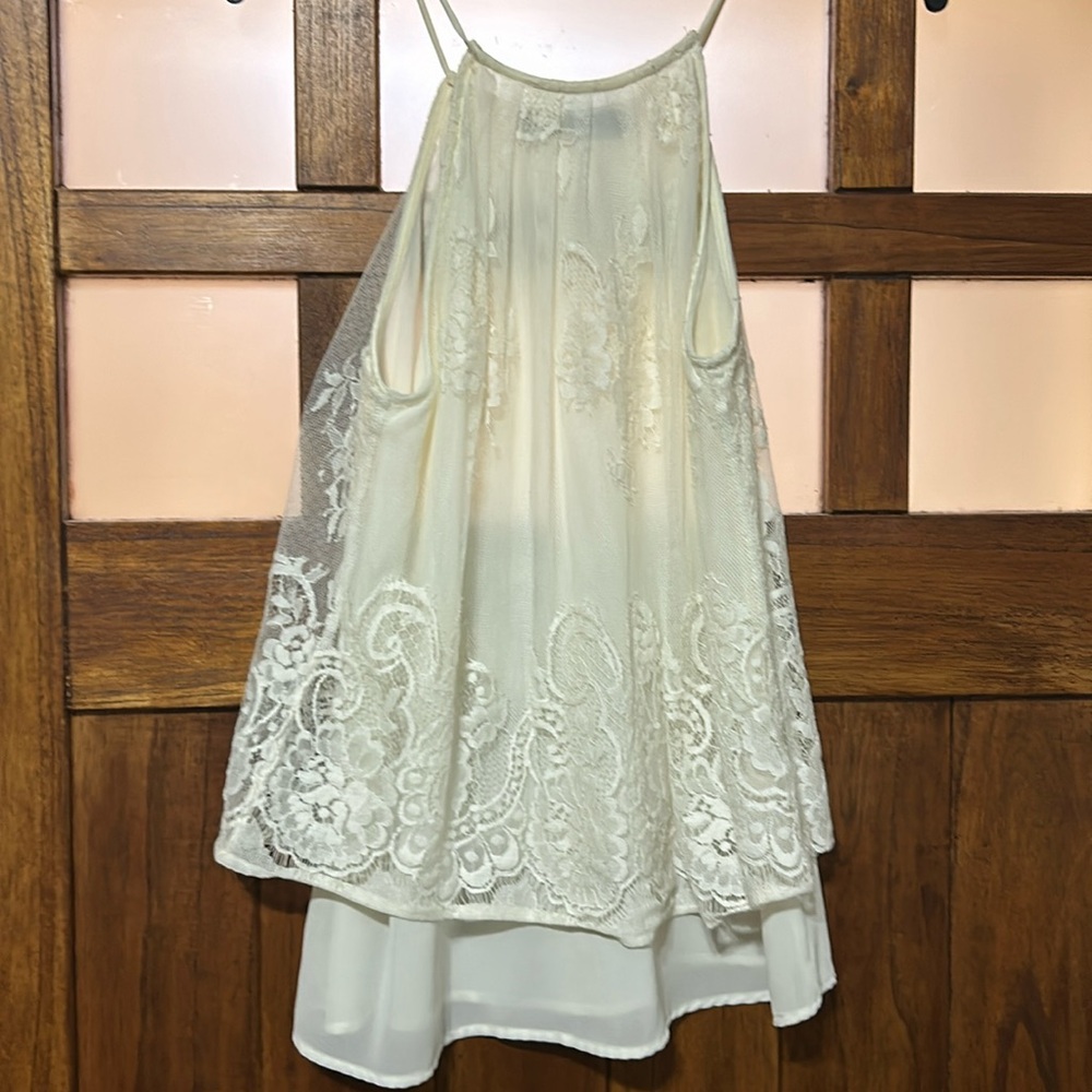 Cream size small spaghetti strap lace top.
